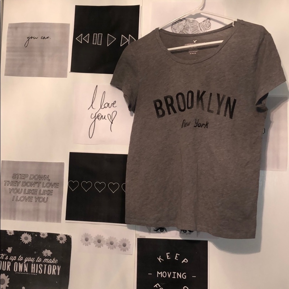 American eagle NYC shirt. Looks cute with jeans!